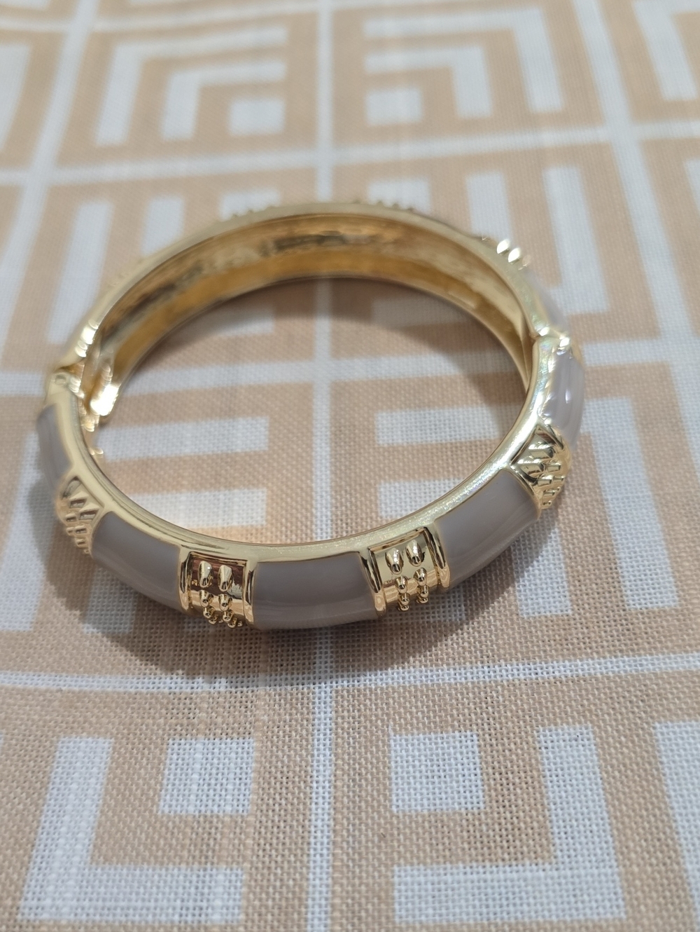 Gold-Tone Bangle Bracelet with Cream Inlay